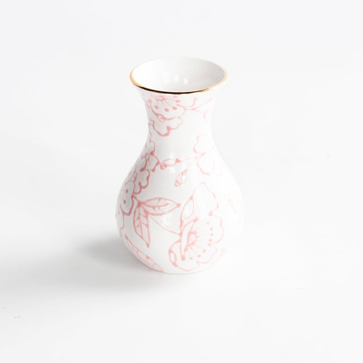 White vase with delicate red outlined peony and leaf chinoiserie pattern and a gold rim