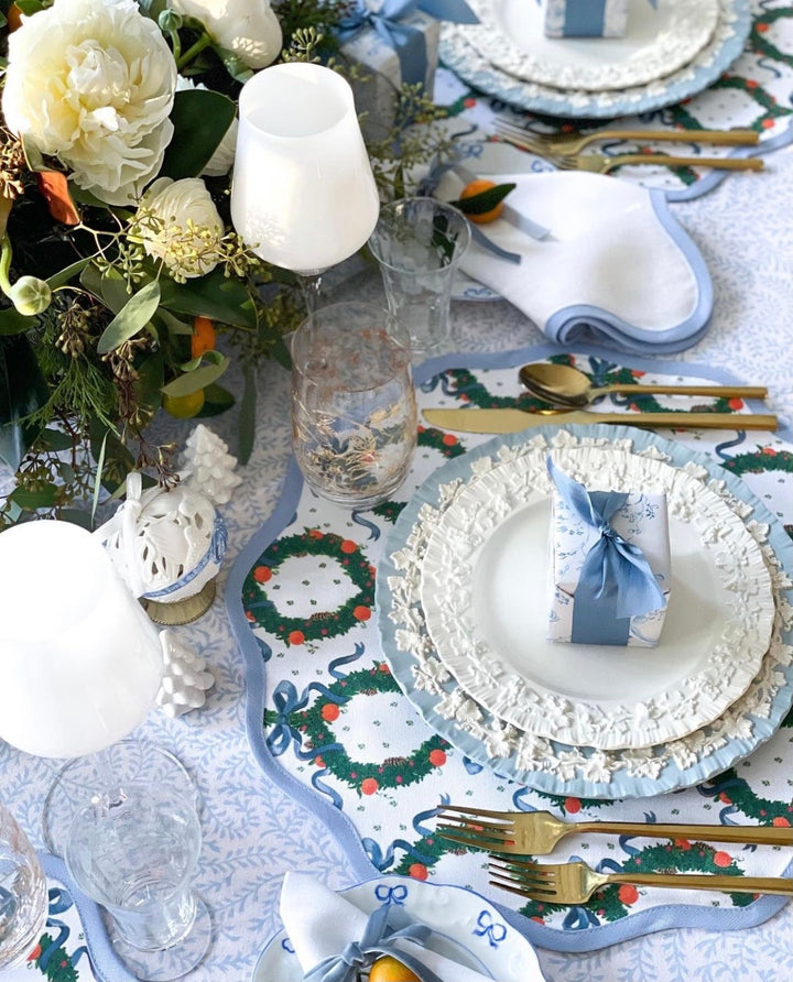 Cornflower Blue Holiday Wreath round placemat, sold as a single mat for one place setting