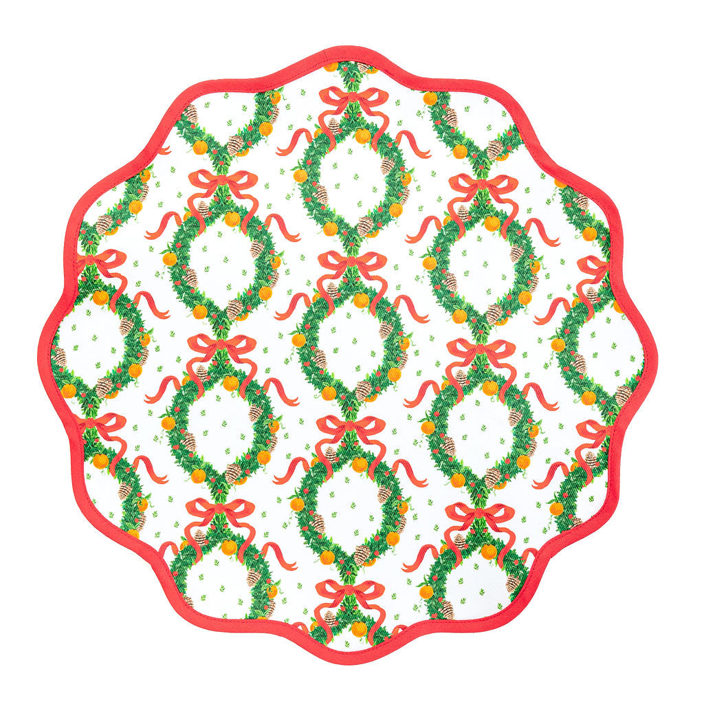 Holiday Wreath round placemat by Frances Fields Home in Rosebud Red