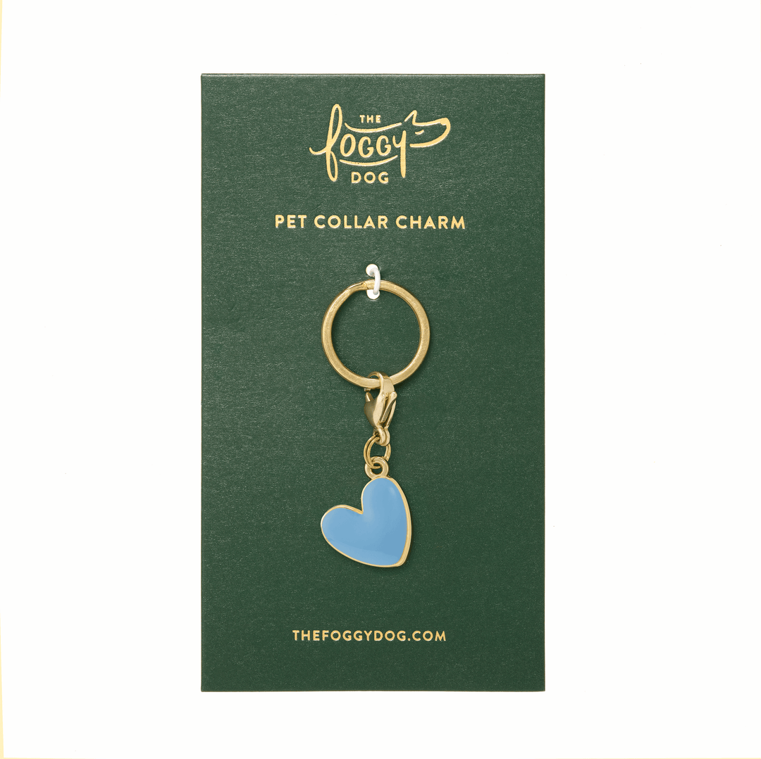 Blue enamel heart charm on its green The Foggy Dog backer card, ready to gift