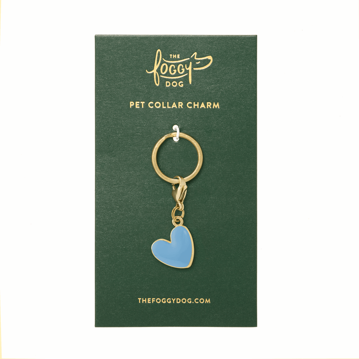 Blue enamel heart charm on its green The Foggy Dog backer card, ready to gift