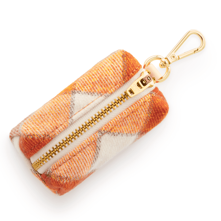 Pumpkin spice plaid flannel poop bag holder in rust, cream, and pink check with gold zipper and clasp