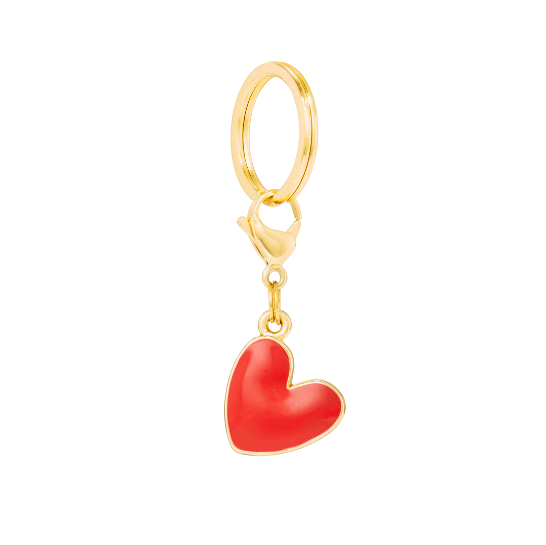 Red enamel heart dog charm on a gold split ring and clasp
