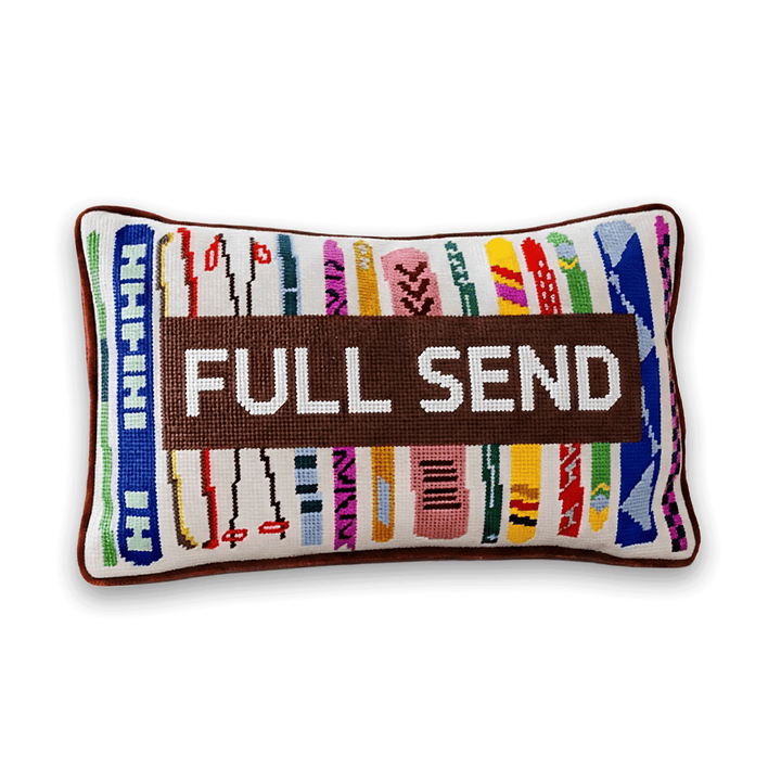 Full Send ski needlepoint lumbar pillow with colorful skis and a Miami border for a ski lodge or apres ski gift