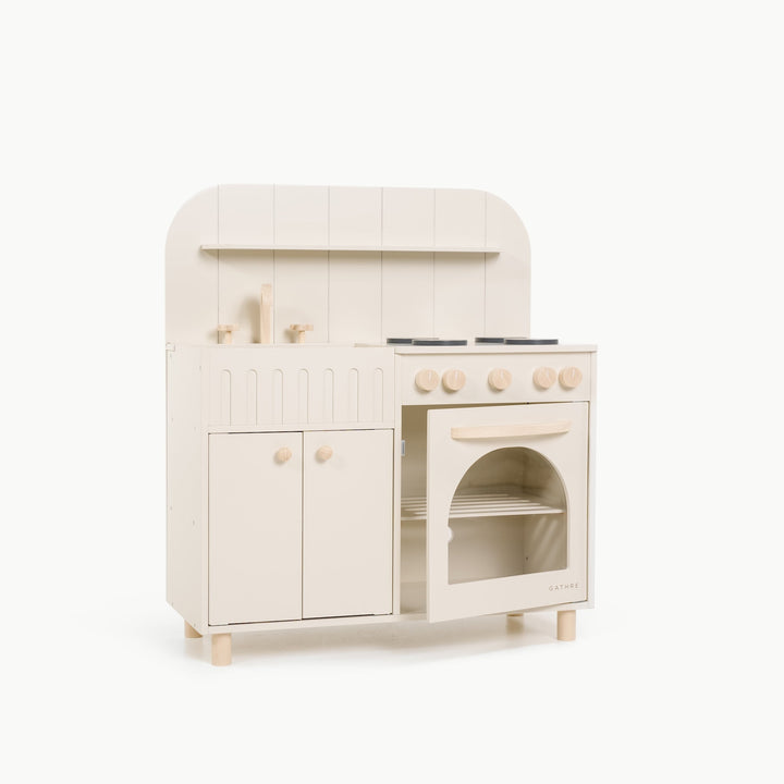 Gathre wooden play kitchen in a modern neutral design for pretend cooking play.