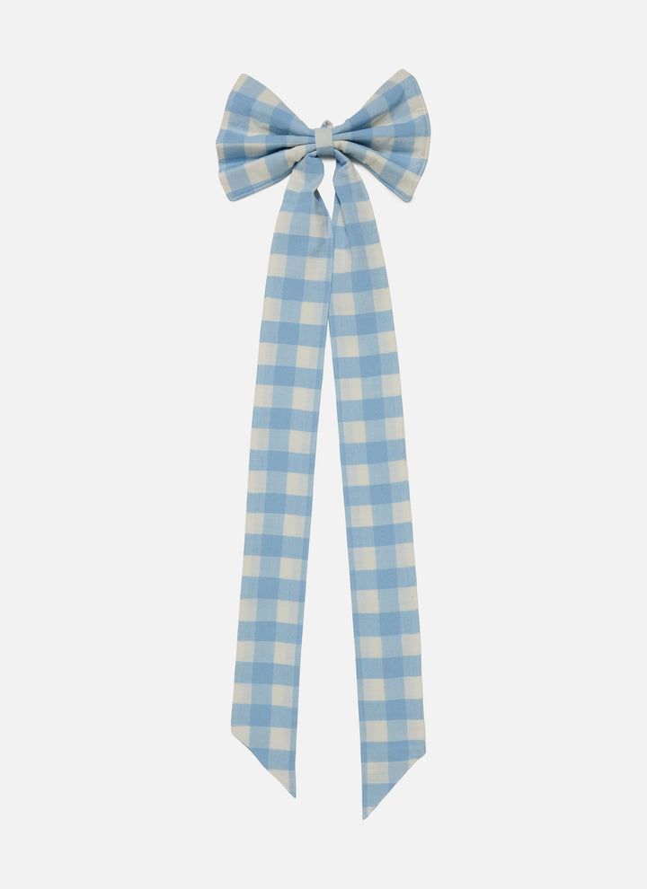 Full baby blue gingham bow showing the sewn hanging loop and the length of the ties