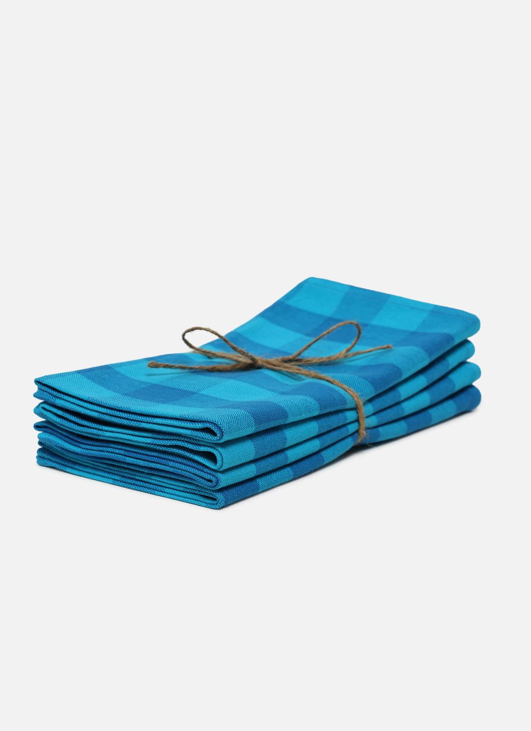 Stack of four turquoise gingham cloth napkins tied with twine on a white background