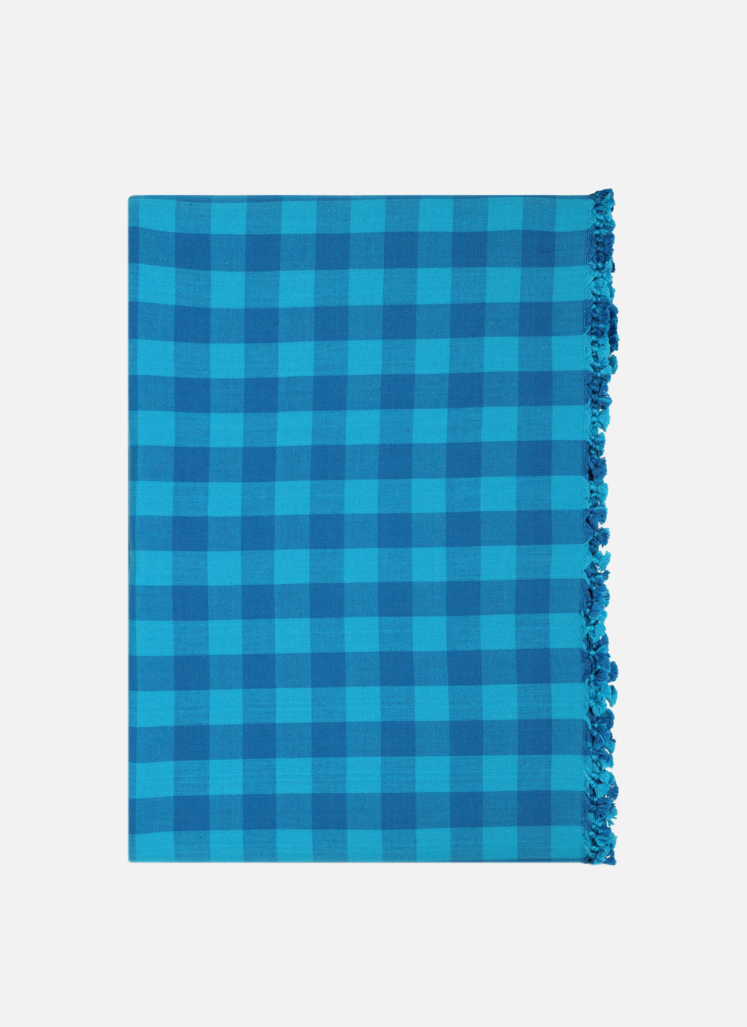 Gingham Zuma turquoise tablecloth folded to show the two-tone blue check