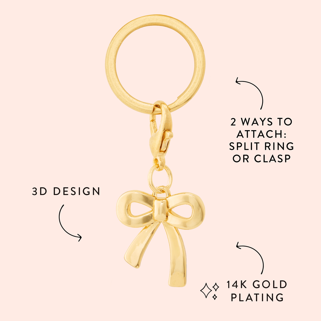 Gold bow charm callout on blush noting the 3D design, 14K gold plating, and two attachment options