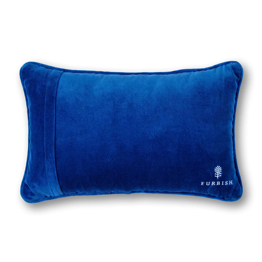 Back of the Grandma Hobbies pillow in cobalt blue velvet with a small Furbish logo