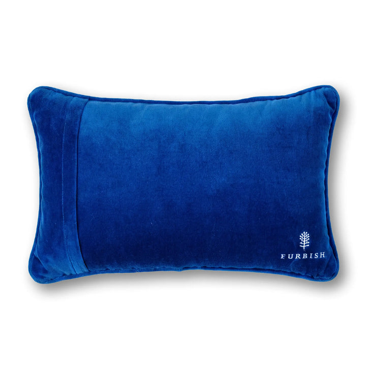 Back of the Grandma Hobbies pillow in cobalt blue velvet with a small Furbish logo
