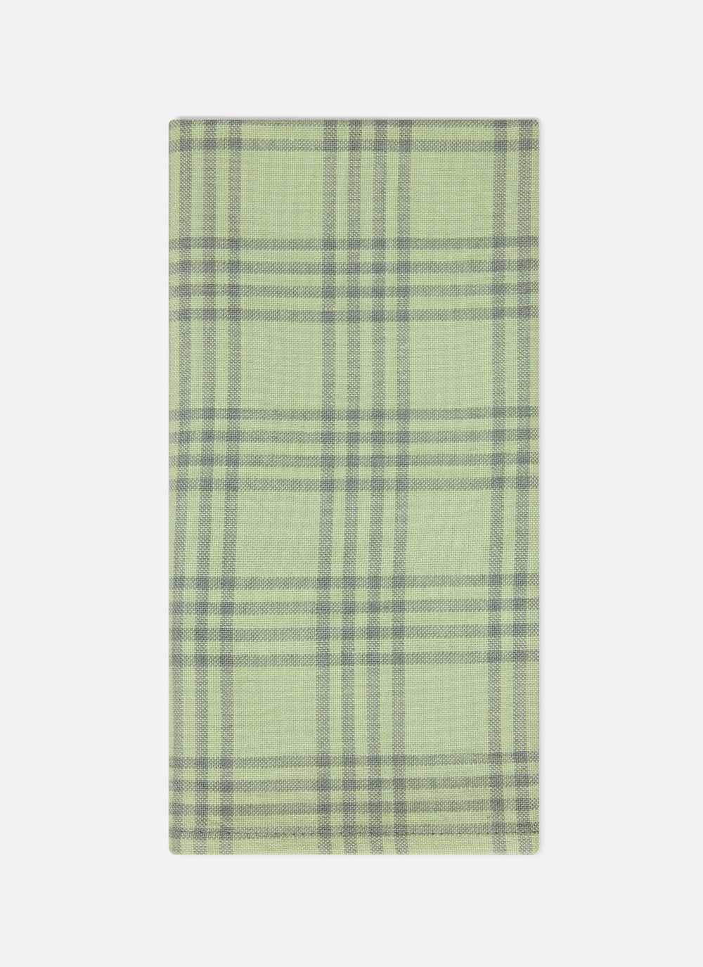 Single Montauk sprout napkin folded to show the soft green windowpane check