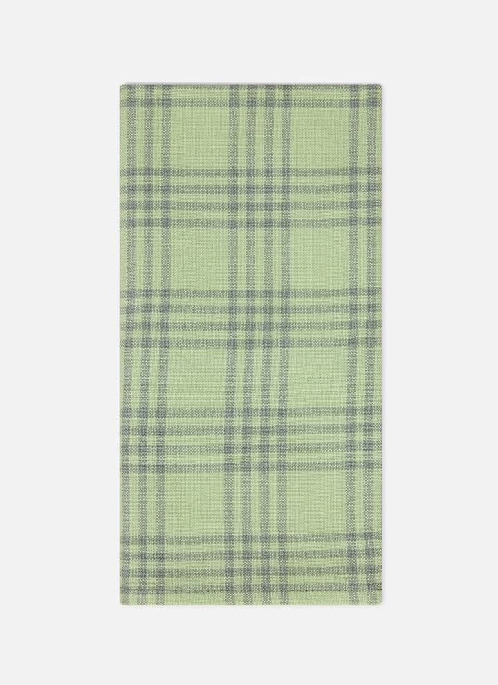 Single Montauk sprout napkin folded to show the soft green windowpane check