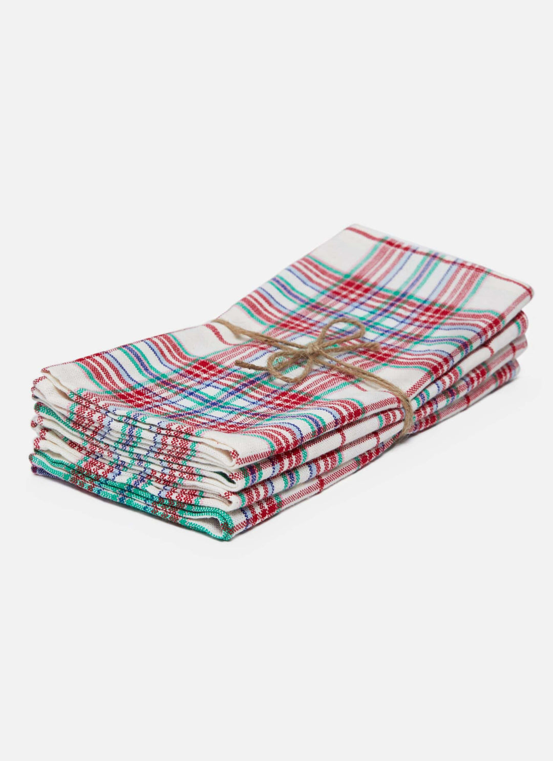 Stack of four folded Clara plaid Christmas napkins on white