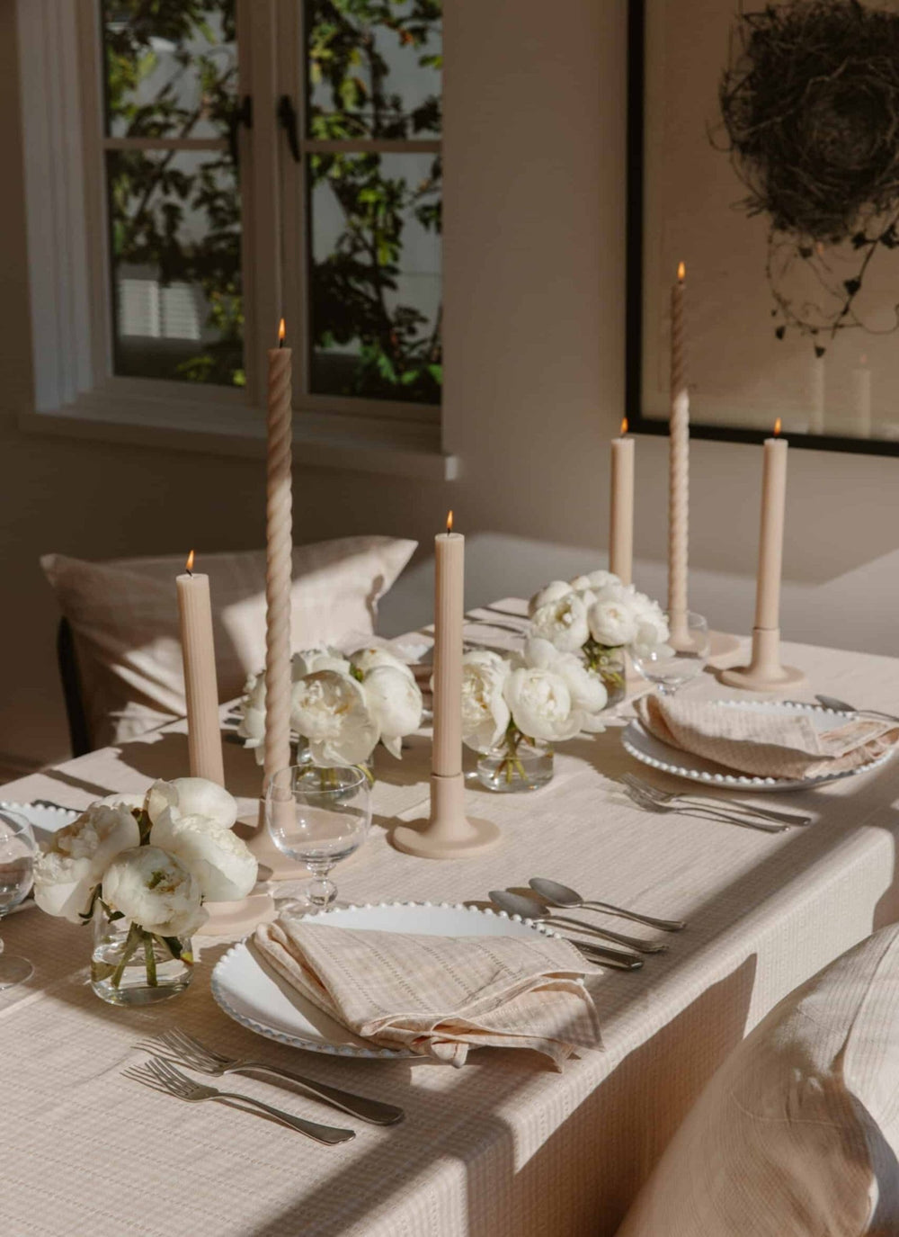 Soho cream tablecloth from Heather Taylor Home, a cream table linen offered in small and large