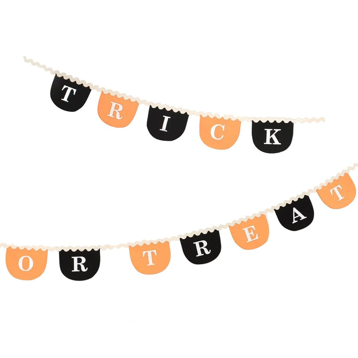 Reusable Halloween banner garland spelling 'TRICK OR TREAT' in black and orange pennant shapes with white letters, shown on a light gray background with a 'REUSABLE' badge.