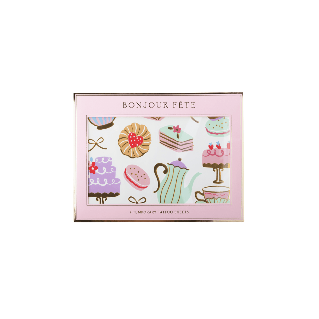 Package of decorative tattoos featuring a pastel tea-and-cake motif, including cupcakes, macarons, cakes, teapots, bows, and coffee cups on a white background.
