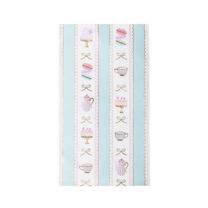 A rectangular paper napkin featuring a vertical striped pattern with pastel pink cakes on stands, teacups, teapots, and bows on a white background with light blue stripes.