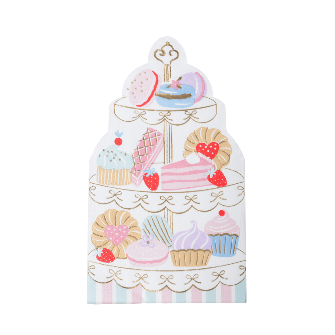 A decorative paper napkin featuring a three-tiered dessert stand decorated with pink, blue, and beige cupcakes, pastries, and macarons on a white background.