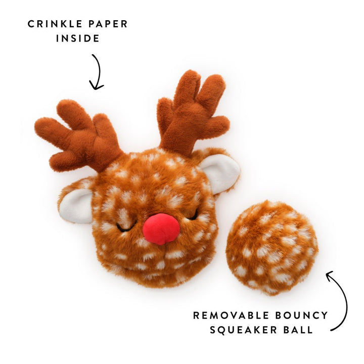 Reindeer toy beside its spotted bouncy squeaker ball, crinkle paper labeled