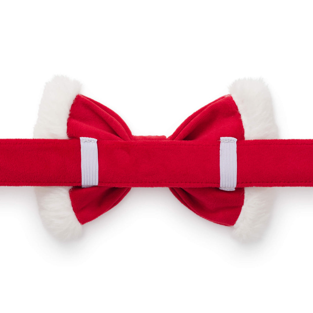Back of the Santa bow tie showing two white elastic loops on a red collar