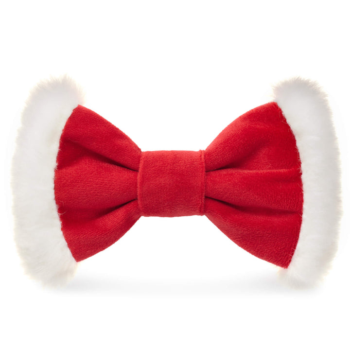 Red Santa dog bow tie with white faux fur trim on both wings, front view on white