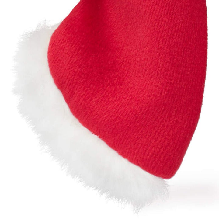 Close-up of a Santa Paws bow tail in red with fluffy white trim