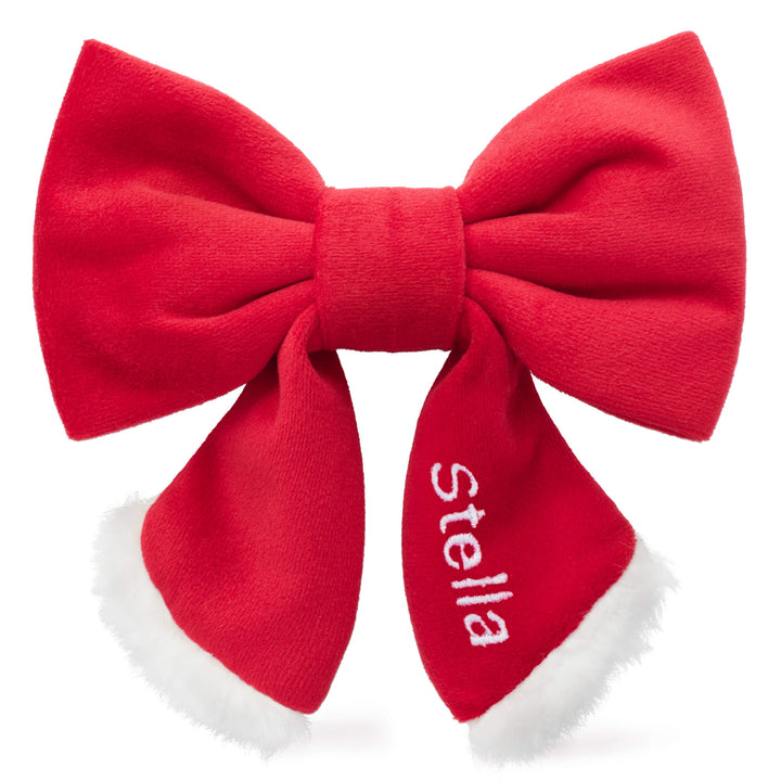 Santa lady bow with a name embroidered on one tail, showing a personalization option from the maker