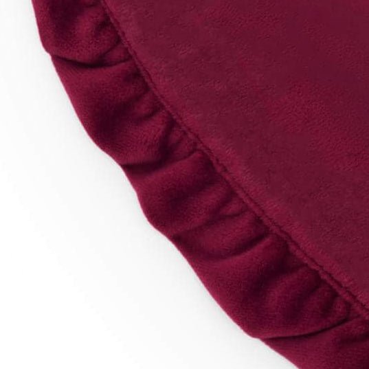 Close-up of the burgundy velvet ruffle along the bandana edge