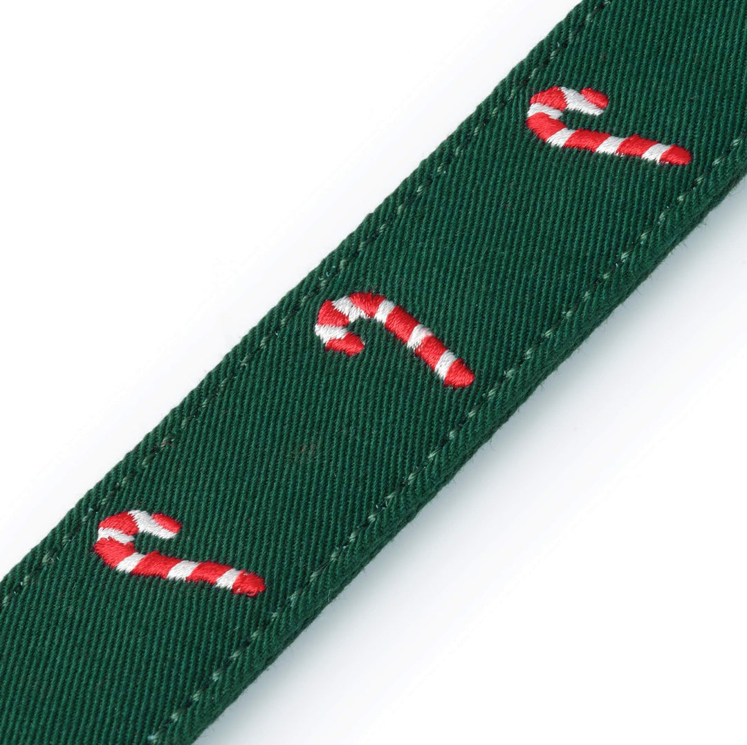 Close-up of candy canes stitched along the evergreen cotton collar