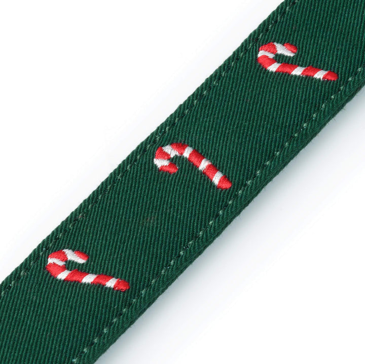 Close-up of candy canes stitched along the evergreen cotton collar