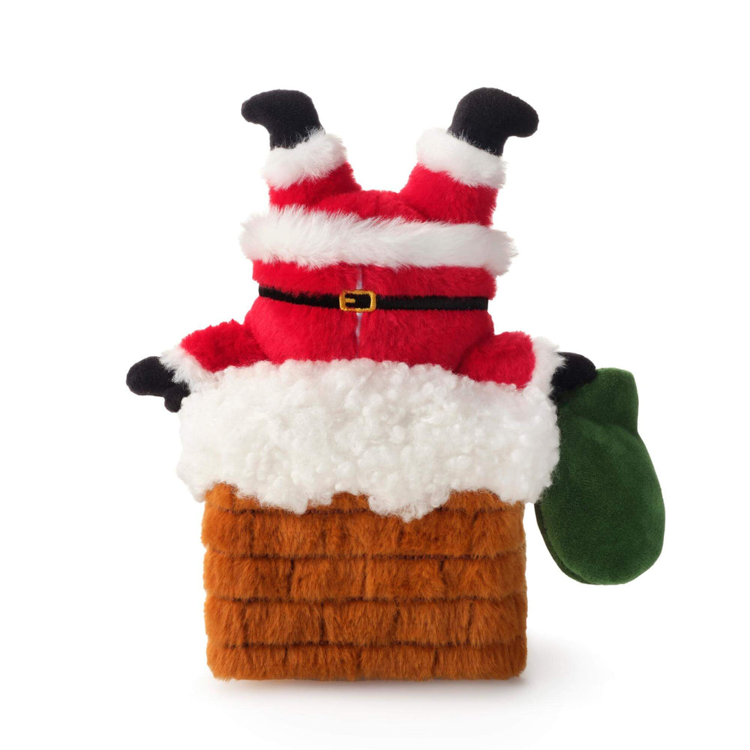 Santa snuffle dog toy with Santa upside down inside the chimney and black boots pointing upward.