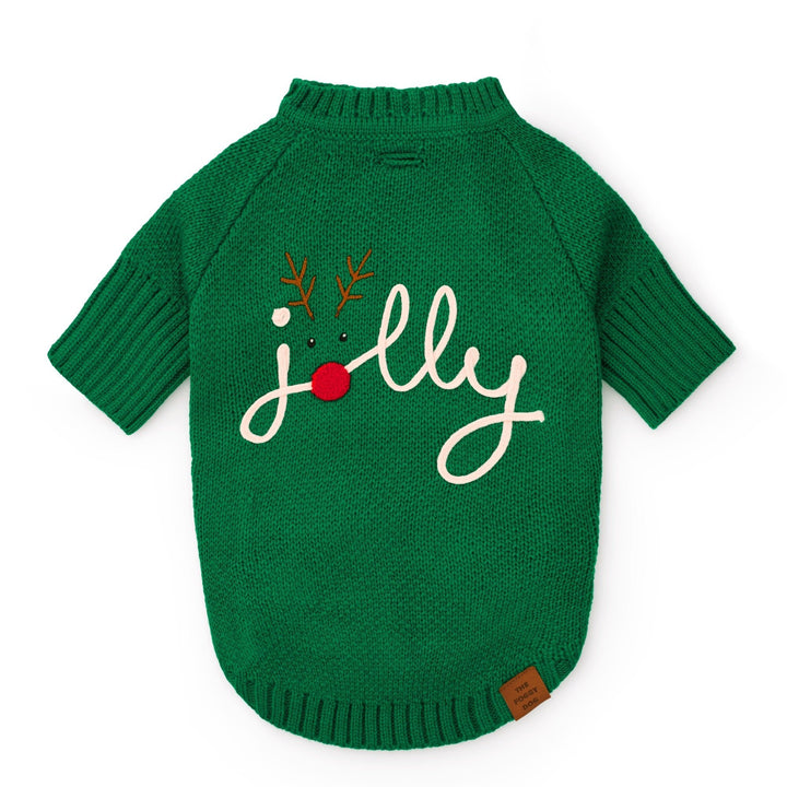 Green Jolly dog sweater laid flat with cream script, brown antlers, red nose, and ribbed crewneck.
