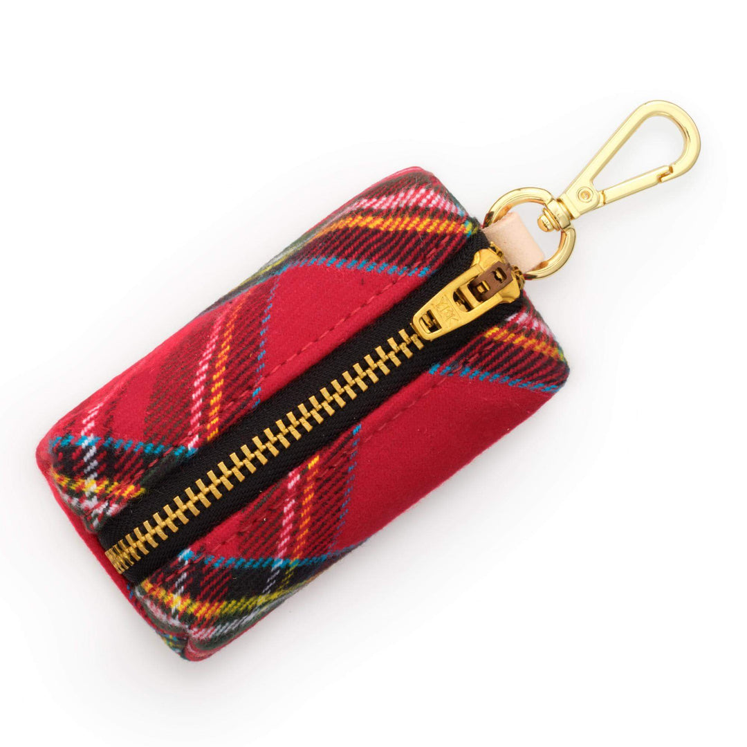 Top view of a red tartan flannel waste bag holder with brass zipper and gold lobster clasp.
