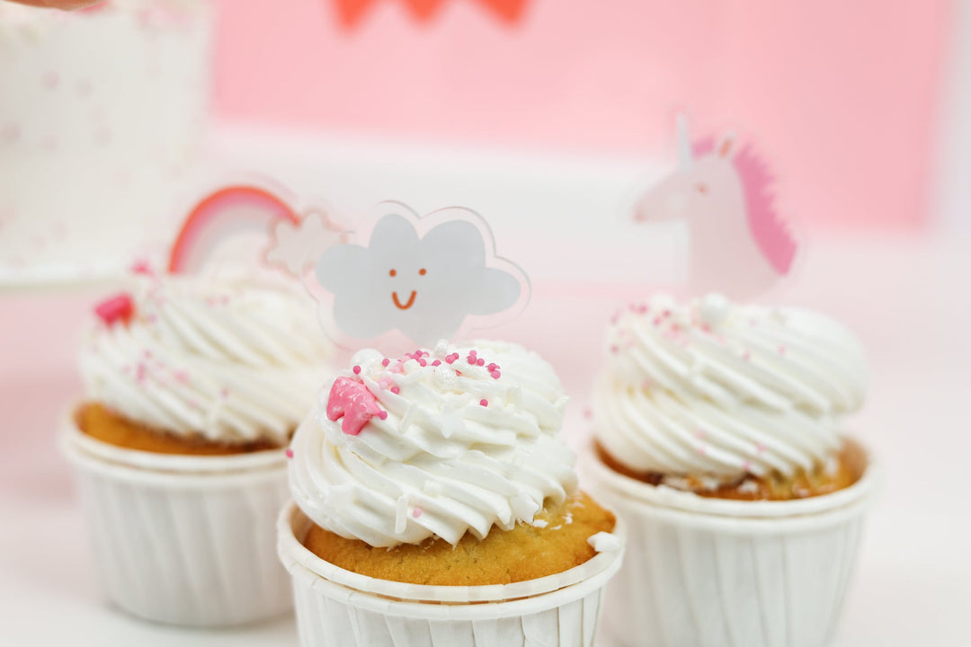 Acrylic unicorn cupcake toppers for a unicorn birthday dessert table