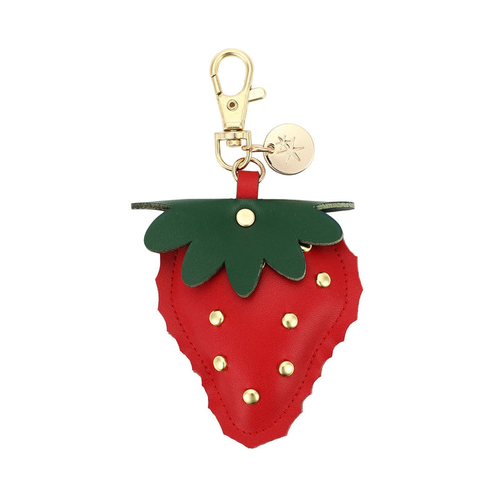 Plush strawberry bag charm with gold stud seeds and a gold lobster clasp