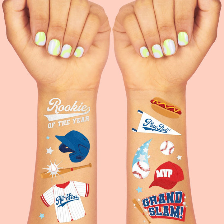 Home Run baseball temporary tattoos by xo Fetti applied on arms with helmets, gloves, and Home Run designs