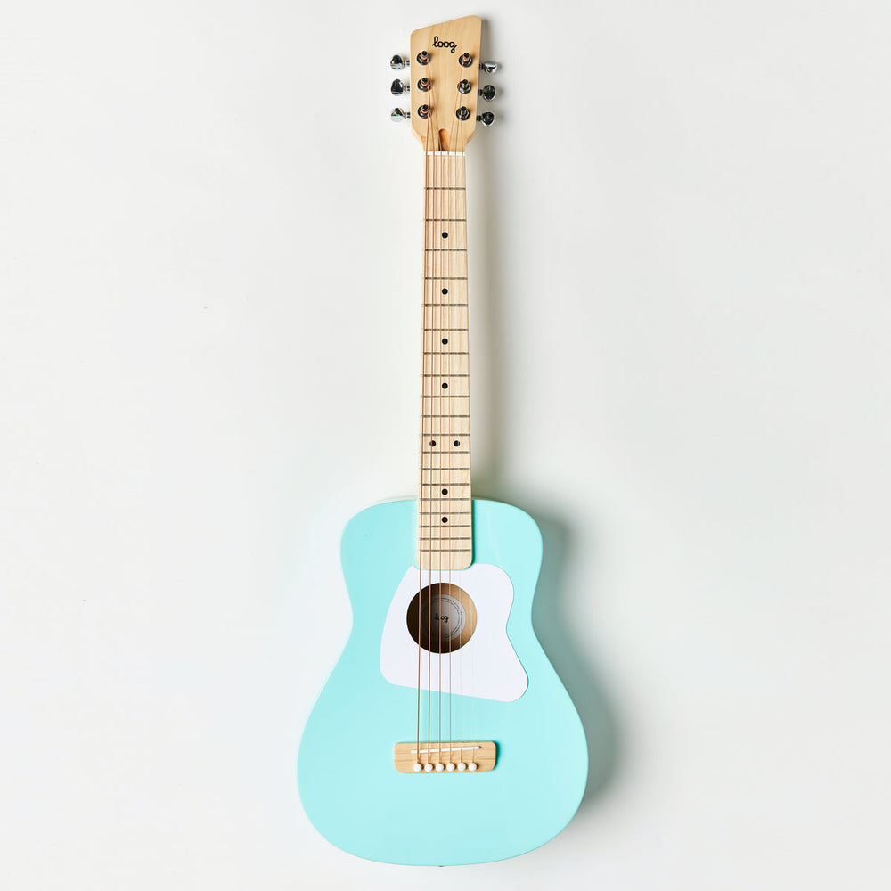 Light blue guitar with wooden neck on a white background