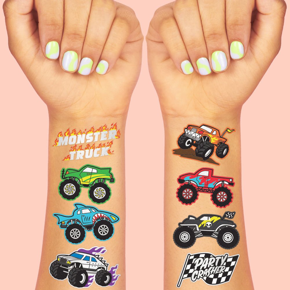 Monster Truck temporary tattoos by xo Fetti applied on arms with monster trucks, flames, and Party Crasher designs
