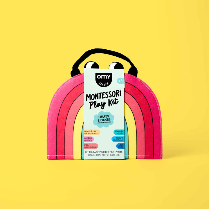 Packaged rainbow-shaped Shapes and Colors Montessori activity kit, front view, on yellow