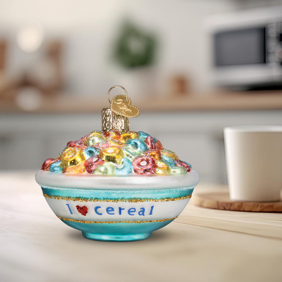 Bowl of cereal ornament set on a kitchen counter beside a white mug for a breakfast lover's gift