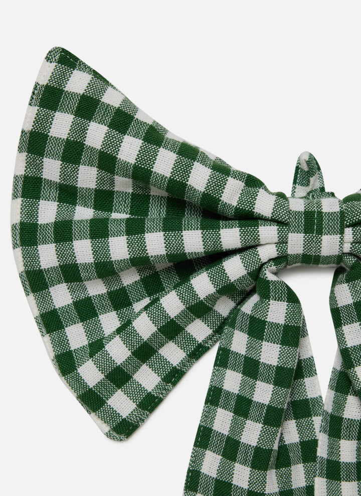 Close-up of the hunter green mini gingham check and the full loops of the cotton bow