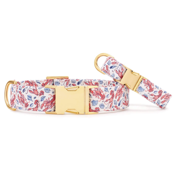 Lobster Landing dog collar shown in gold and rose gold hardware