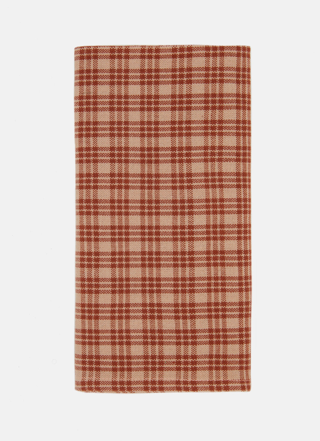 Katherine plaid cloth napkin in oatmeal and burnt sienna, folded to show the handwoven check