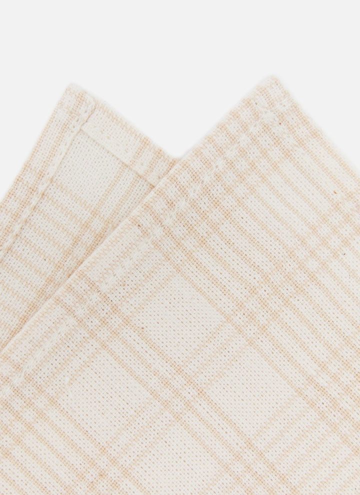 Close-up of the cream-on-cream Marianne plaid weave showing the subtle windowpane pattern