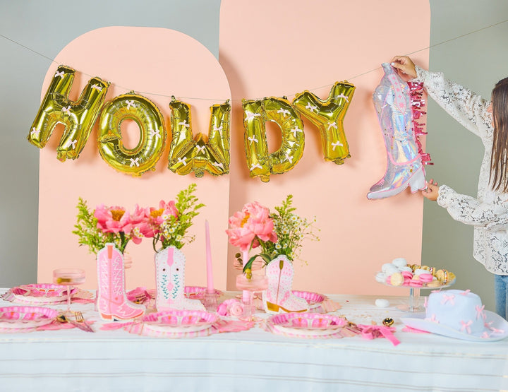 Pink cowboy boot balloons by Packed Party, two confetti-filled balloons for a western or cowboy themed party