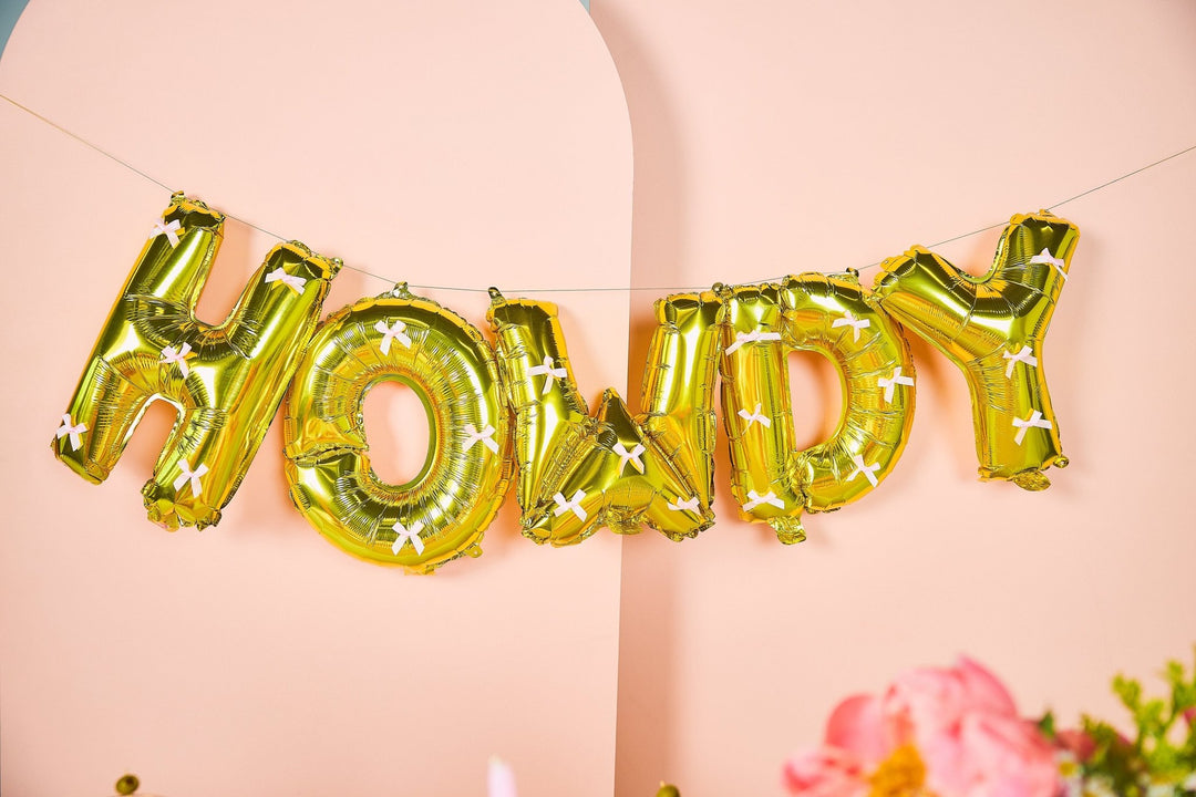 Western themed gold balloon banner for cowgirl bachelorettes and birthdays