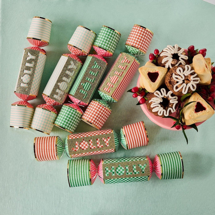 Gold foil Christmas crackers for holiday dinner place settings