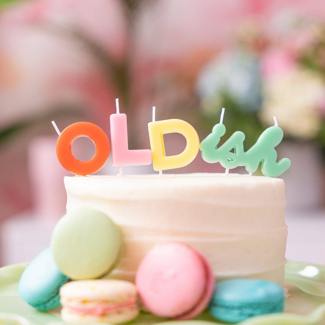 Funny OLDish letter birthday candles, about 6.3 inches across as displayed