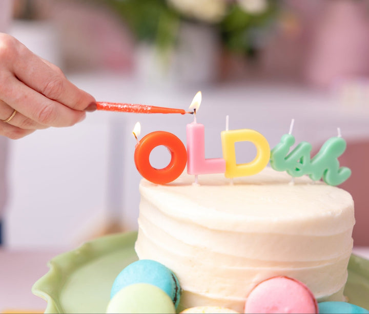 Colorful OLDish cake candles for 30th, 40th, and 50th birthdays